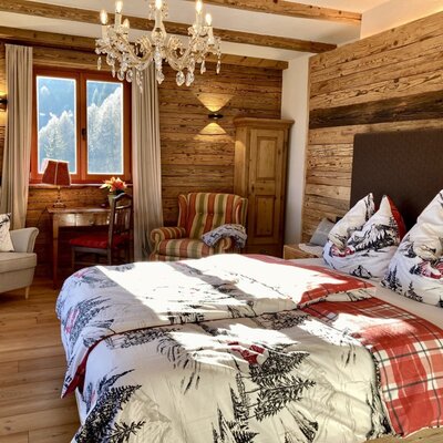 Nachmittagssonne im Schlafzimmer@Chalet Almhaus Strobl
