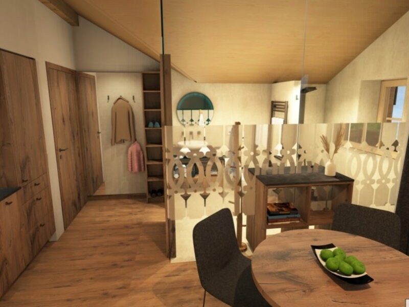 Ein moderner, gemütlicher Wohnbereich des Bauernhofs mit stilvollen Holzmöbeln und einem offen gestalteten Grundriss.
