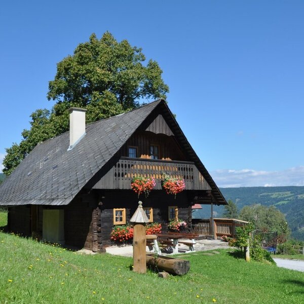 Holzhaus Brunnen